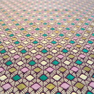Tessuto jacquard motivo geometrico a rombi