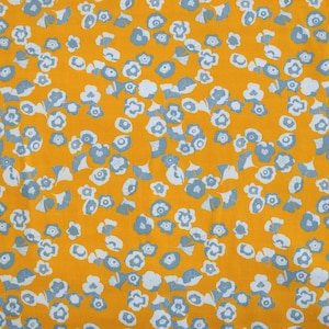 Cotone elasticizzato stampa floreale e fondo giallo