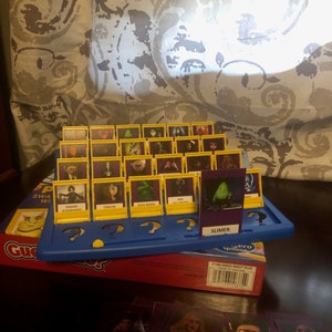Halloween Family Friendly Movies Guess Who Game Characters - PHYSICAL GAME