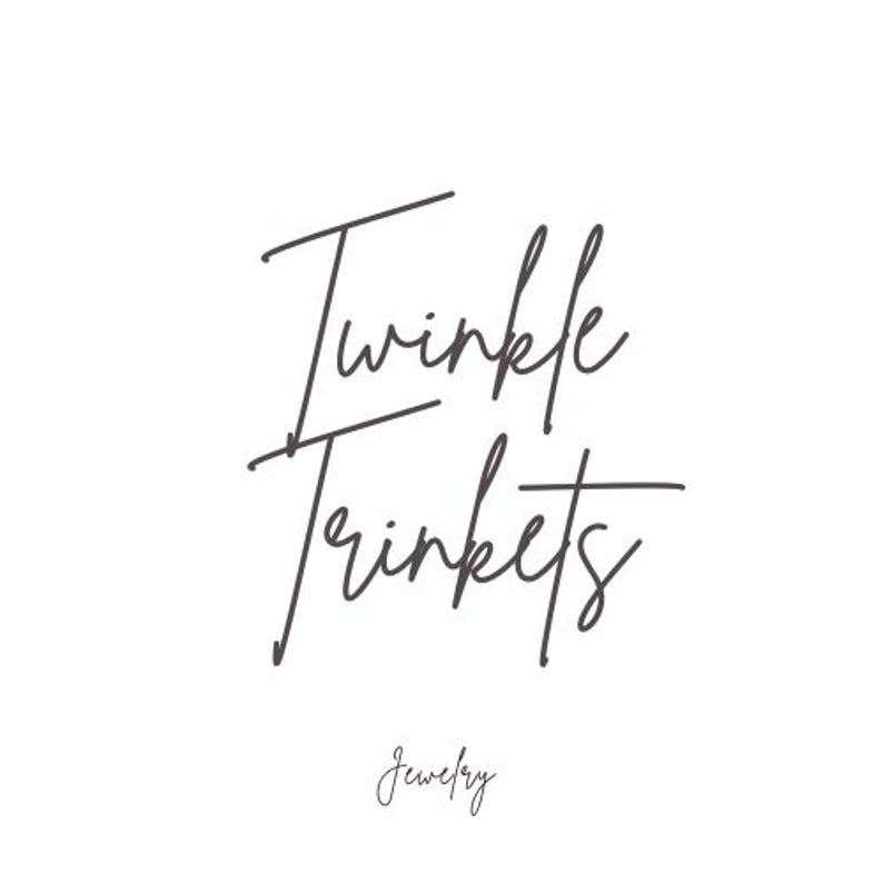 May include: A logo with the words "Twinkle Trinkets" in a handwritten style, with the word "Jewelry" below it. The text is in a dark gray color against a white background.