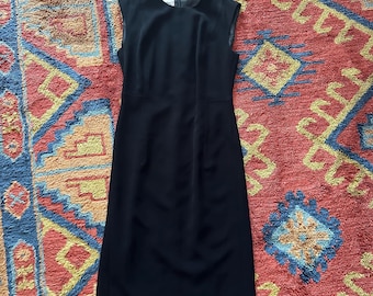 Vestido de cóctel negro de Calvin Klein, sin mangas, con abertura en la espalda y ajustado, de los años 80, con forro, talla 2