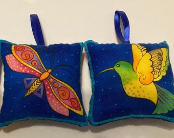 Laurel Burch Flying Colors handmade pillow ornaments set of 3 includes a hummingbird, butterfly, and dragonfly