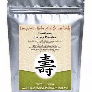 May include: A silver resealable pouch with a white label that reads "Longevity Herbs And Superfoods Eleuthero Extract Powder". The label also includes the ingredients, suggested use, storage instructions, and a website address. The pouch has a green background with a black Chinese character in the center.