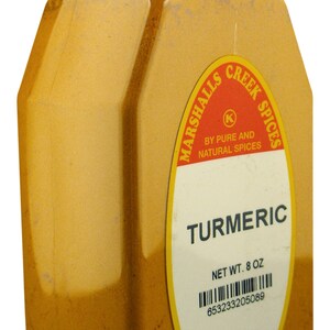 May include: A yellow plastic jar of turmeric spice with a red and white label that reads "Marshalls Creek Spices" and "Turmeric". The label also includes the net weight of 8 ounces and a barcode.