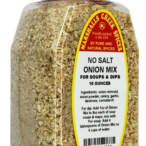 May include: A clear plastic spice jar with a red screw-top lid containing 10 ounces of dried onion mix. The yellow label reads Marshalls Creek Spices, No Salt Onion Mix for Soups & Dips, listing ingredients and instructions for preparation.