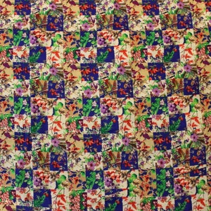 May include: A fabric with a checkered pattern featuring a variety of colourful floral designs. The fabric is a mix of white, blue, green, red, and pink.
