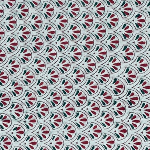 May include: White fabric with a repeating pattern of maroon and dark green stylized leaf shapes. The leaves are arranged in a scalloped design, creating a textured appearance. The fabric is likely used for textiles or home decor.