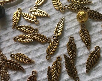 100 Antique Gold Leaf Charms: Brass Jewelry Accessory