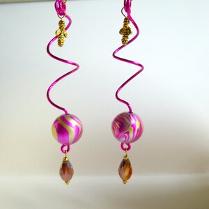 Twisted Wire Dangle Earrings with a Bee Charm and Teardrop Crystal, Curly Gold and Magenta Ball Hanging on Wire Dangle Earrings, E111