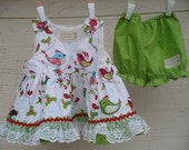 Baby Girls Xmas dress and bloomers size 0, featuring bird print fabric in red and green.