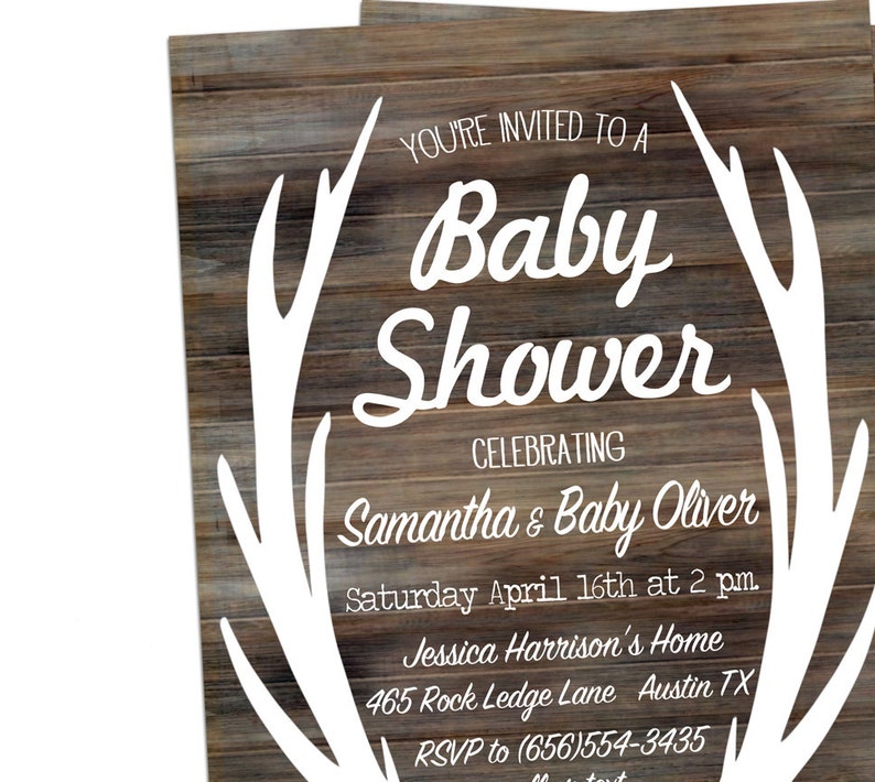 May include: A rustic woodgrain background with white antlers framing the text "You're invited to a Baby Shower celebrating Samantha & Baby Oliver. Saturday April 16th at 2 pm. Jessica Harrison's Home 465 Rock Ledge Lane Austin TX RSVP to (656)554-3435"