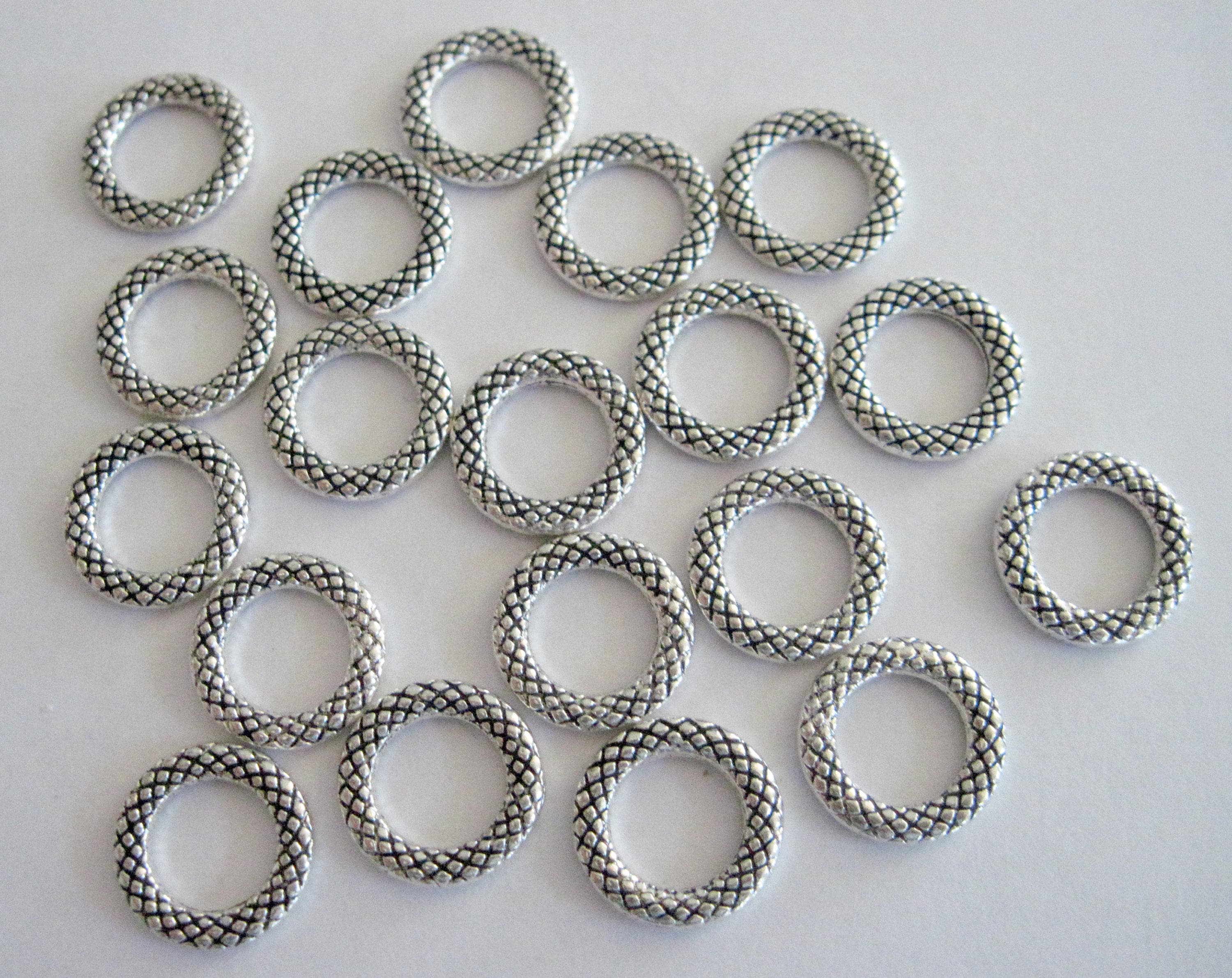 Small Textured Sterling Silver Open Jump Rings (set of eight) – VDI Jewelry  Findings