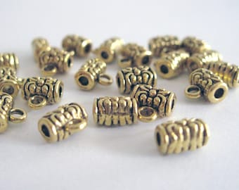 10 Tiny Gold Color Bail Beads with Carved Pattern.