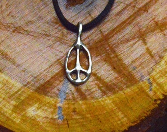 Woodstock Peace Sign    This is a  smaller  version of a peace sign that was bought at Woodstock in 1969.