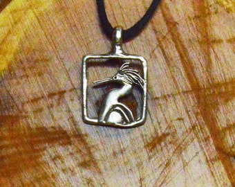 Snowy Egret in Sterling Silver, detailed on both sides.