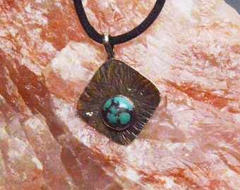 Round Cabochon Turquoise Set In Textured Sterling Silver Pendant