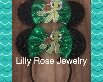 Sparkly Squirt Minnie Mouse Ears Inspired Headband Green Sequin Bow with Squirt the Turtle Embellishment Fits Adults Children Ready to Ship