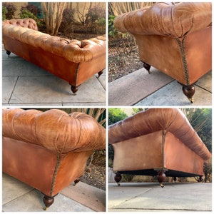 May include: A brown leather tufted sofa with wooden legs and brass casters. The sofa is shown from multiple angles, including the back, side, and bottom.