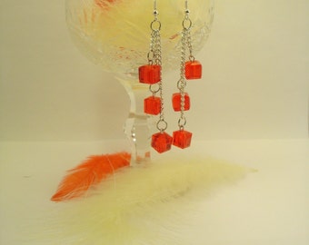 Dangling long earrings with balls