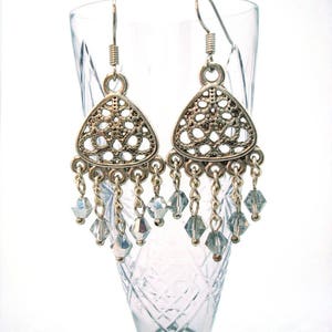Dangling earrings with Crystals