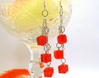 Dangling long earrings with balls