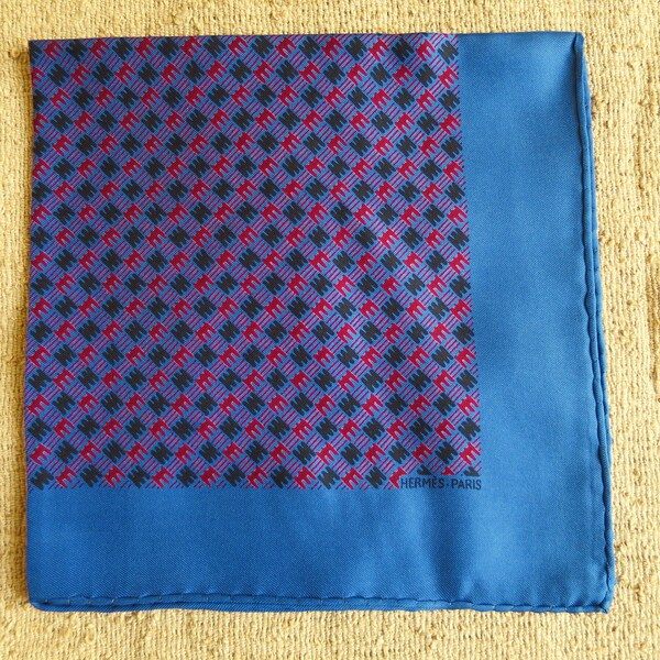 Hermès gavroche scarf, in silk, with red and black patterns on a peacock blue background, vintage, small square