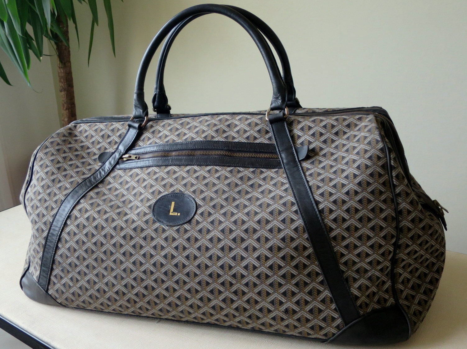 sac de voyage a main goyard en toile coton