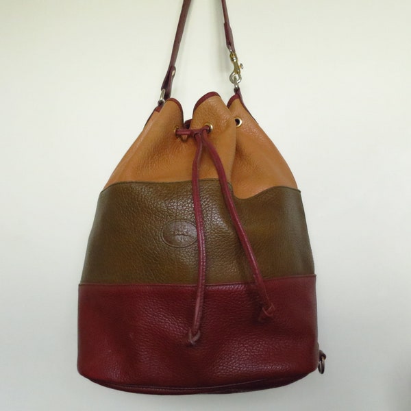 Large LONGCHAMP Paris bucket bag with adjustable shoulder strap in tricolor leather