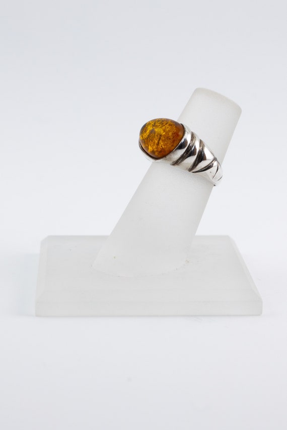 Oval amber and sterling silver ring