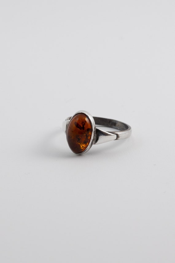 Oval amber and sterling silver ring