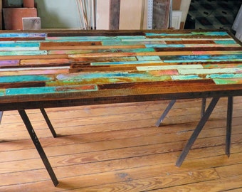 Colorful wood mosaic coffee table distressed and rustic barn wood.