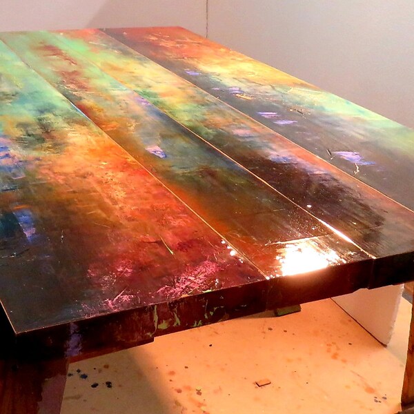 bohemian painted dining table. colorful kitchen table art, whimsical painted furniture. Maximum red kitchen decor.