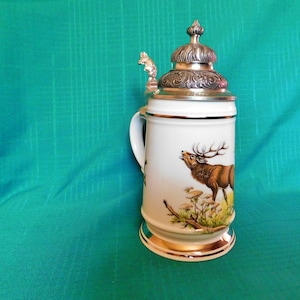 Handmade German stein with pewter lid near mint condition