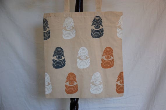 Canvas Tote Bag With Original "Here's Lookin'" Block Print Pattern in Blue , White & Yellow Ink on One Side // "Caring" Print Design Option
