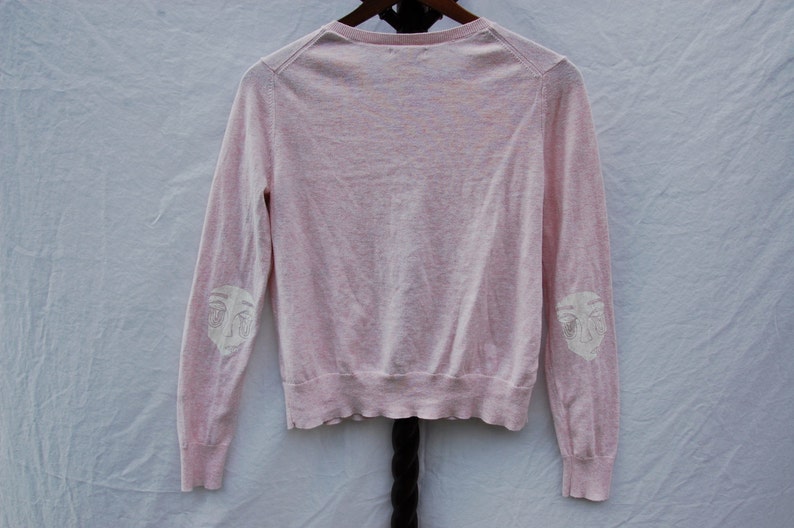 Thrifted Gap Brand Cardigan Original No Face Screen Print Design Printed on Elbows in White Ink Size Large Light Pink