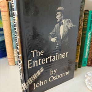 1st edition The Entertainer by John Osborne Faber 1957 First Edition in original dust jacket by Tony Armstrong Jones beautiful rare copy