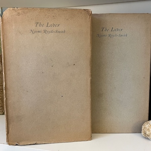 Two 1st edition signed copies of The Lover by Noami Royde-Smith. Both signed to relatives of the author. Dust jacket on both