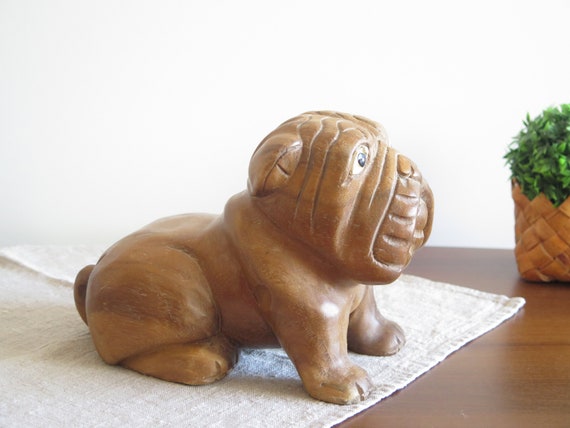 carved wooden dog