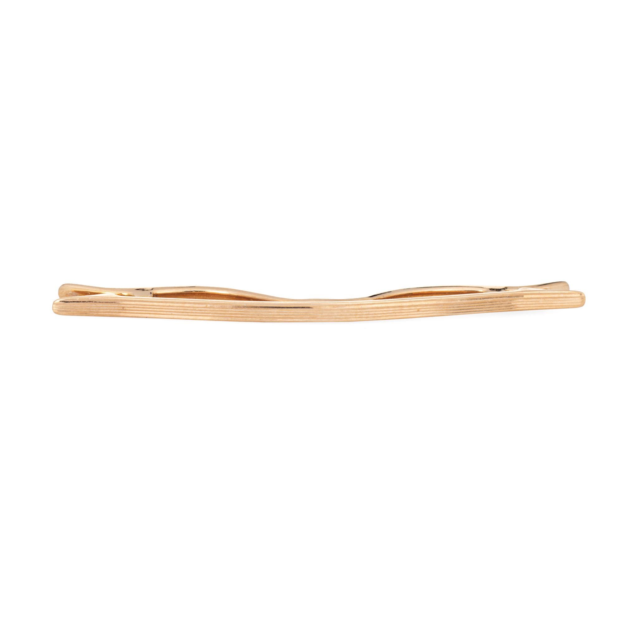 Santos de Cartier tie clip