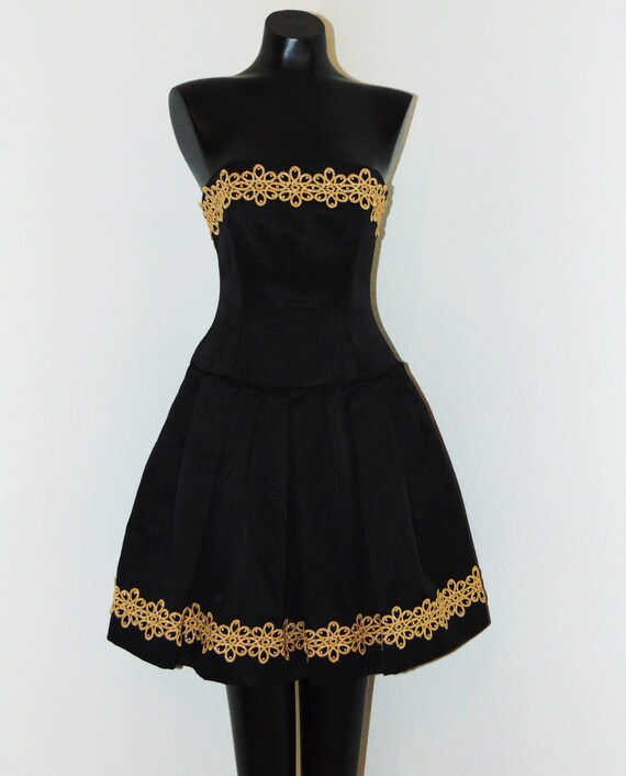 black dress with gold trim