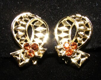 Vintage Gold tone Ribbon design clip on earrings with Brown Rhinestones