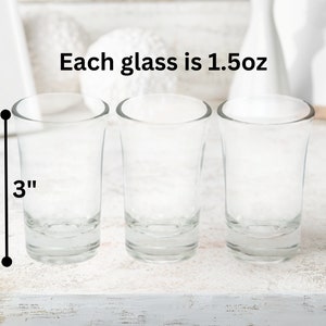May include: Three clear glass shot glasses, each measuring 3 inches tall and holding 1.5 ounces.  Each glass is 1.5oz.