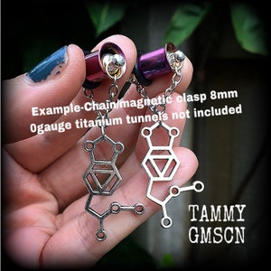 These awesome earrings feature a pair of antique silver MDMA molecules, measuring just under 5cms from tip to tip, weighing only a gram or two each.