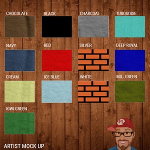 May include: A color chart for shirts, featuring swatches in various colors like chocolate, black, charcoal, turquoise, navy, red, silver, deep royal, cream, ice blue, white, and military green. The text indicates the design is not offered in blocked-out colors.