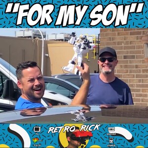 May include: Two men smiling, one holding a white and black toy robot. The text "FOR MY SON" is at the top of the image. The bottom of the image has the text "RETRO RICK" with icons for TV, toys, movies, and games.