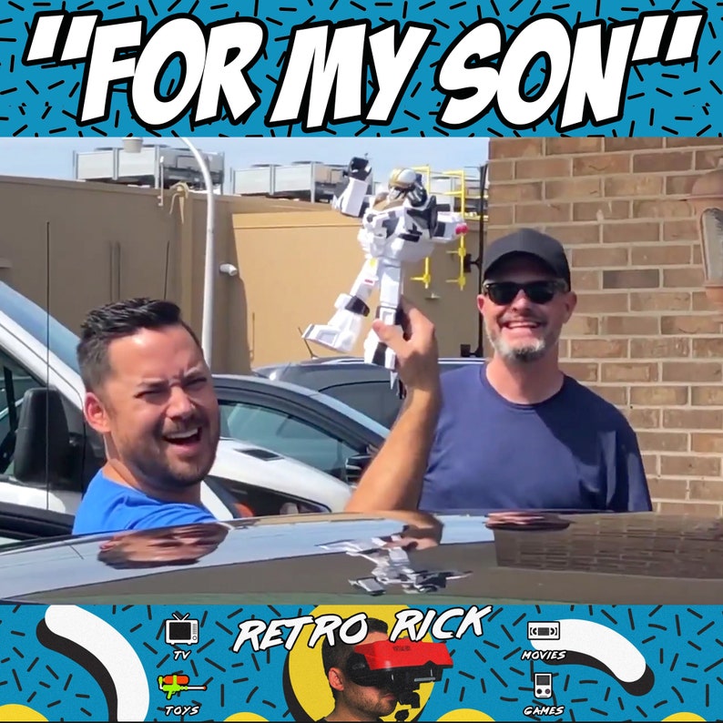May include: Two men smiling, one holding a white and black toy robot. The text "FOR MY SON" is at the top of the image. The bottom of the image has the text "RETRO RICK" with icons for TV, toys, movies, and games.