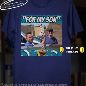 May include: Navy blue t-shirt featuring a graphic with the text "FOR MY SON" above a photo of two men. The design includes the text "RETRO RICK" and the phrase "BUY IT TODAY!"