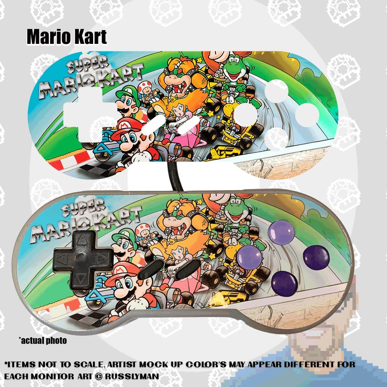 May include: Two Super Mario Kart-themed game controllers. The controllers feature a colorful design with Mario, Luigi, Princess Peach, and other characters racing on a track. The text "Mario Kart" and "Super Mario Kart" are visible.