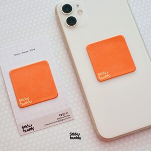 StickyBuddy Herbruikbaar Microvezel Schermreinigingspad voor Telefoon, Laptop, Switch | Effen Oranje