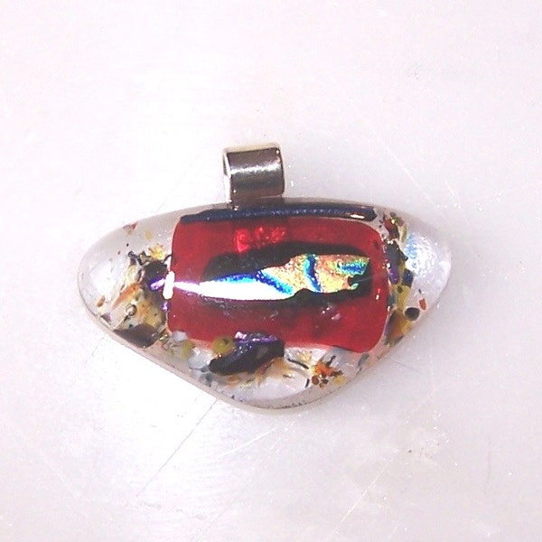 Triangle shaped clear red black and dichroic glass pendant with silver plated tube bail.